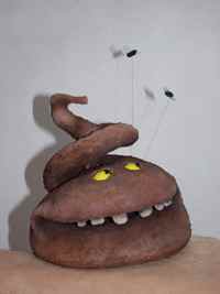 Puppenbau-Klugscheisser verfolgt mit den Augen die Fliegen